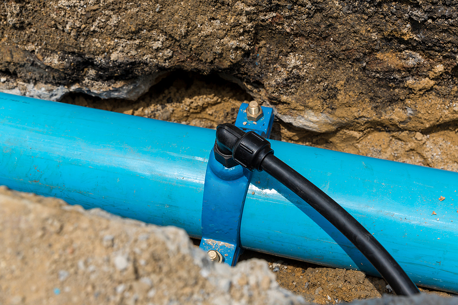 Construction site with new Water Pipes in the ground. sewer pipes to repair or restore in street city