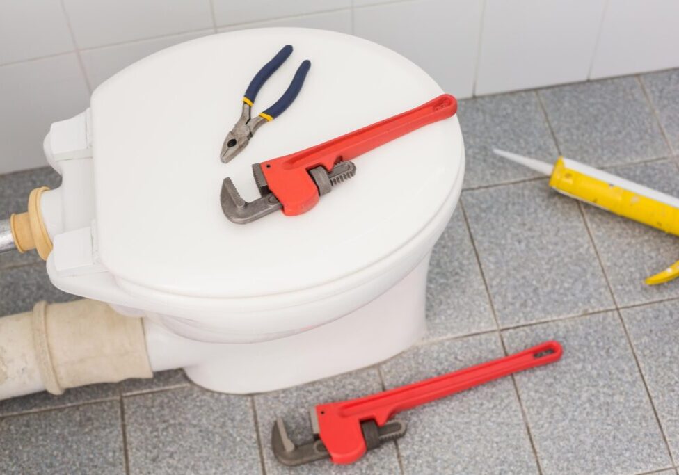 tools on top of toilet